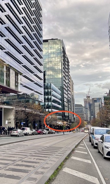 Collins Street with the destination towers ahead on the right