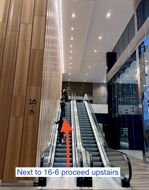 Escalator next to lift core 16-6, going up
