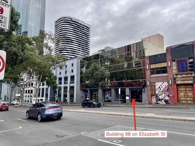 RMIT Building 98 dark glass facade across Victoria Street
