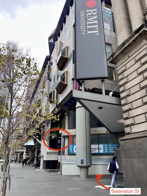 RMIT University banner above the Building 8 entrance on Swanston Street