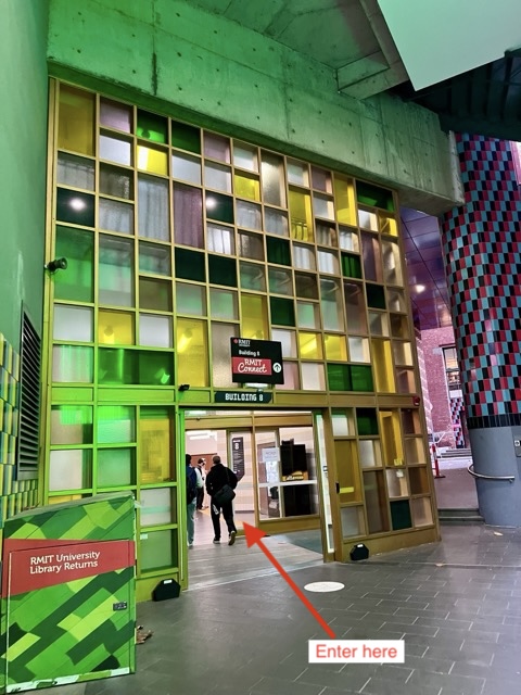 Green-glass Building 8 RMIT Connect entrance doors