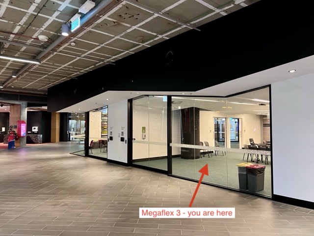 Glass-walled Megaflex 3 room, you are here