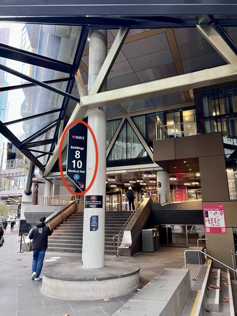 RMIT Buildings 8 and 10 directory pillar and forecourt steps